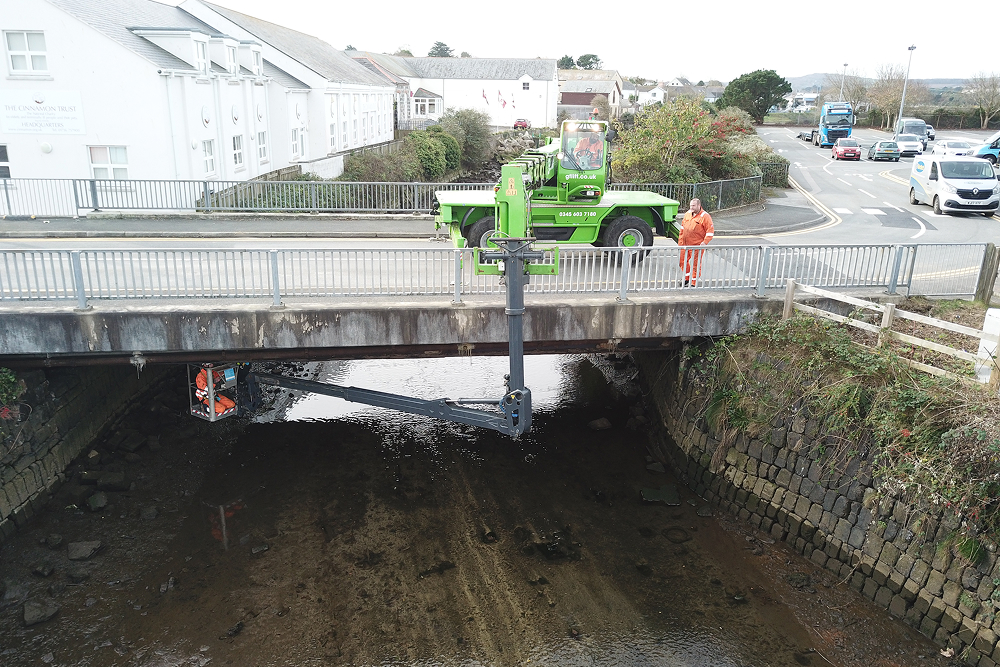 Engineers performing a safety assessment atop the bridge.